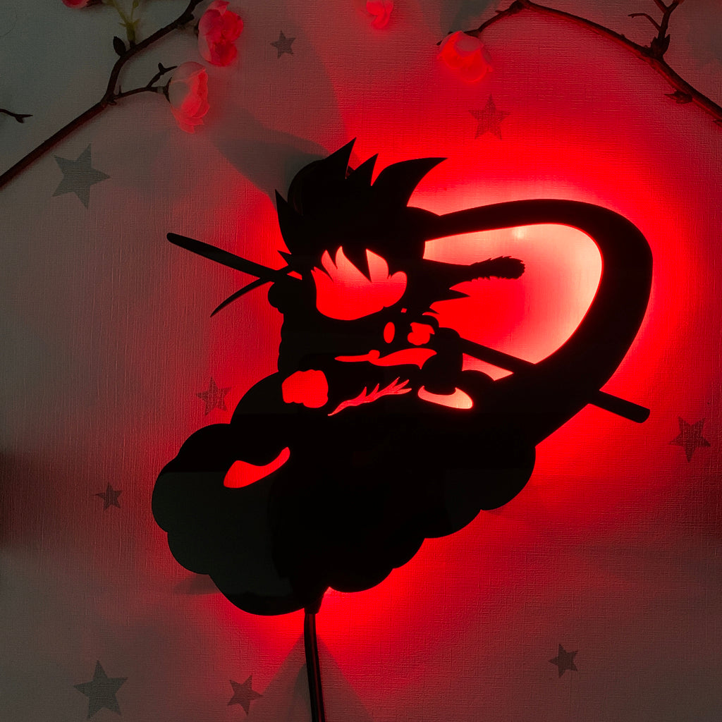 Dragon Ball Kid Goku on Flying Nimbus anime silhouette light