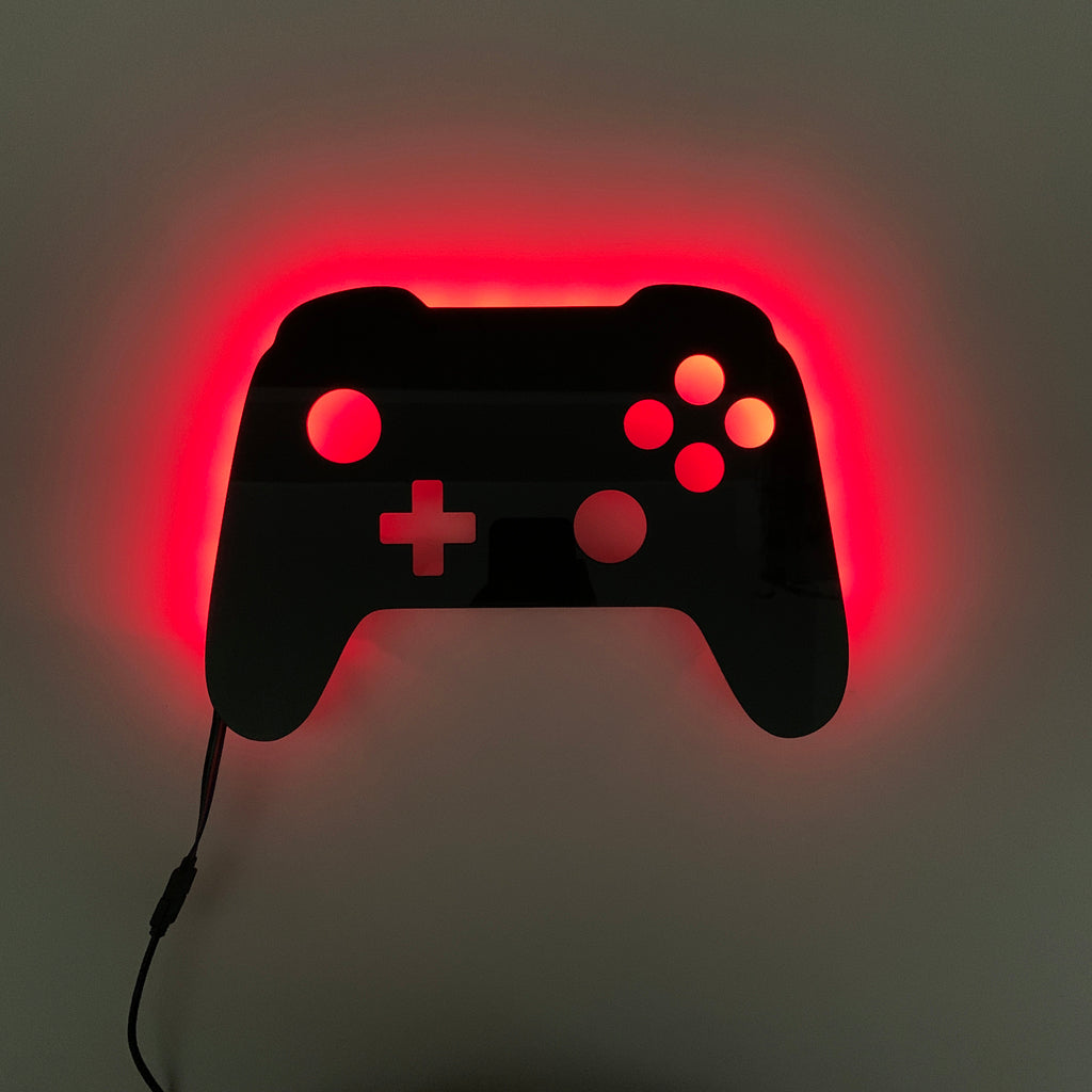 Gaming controller silhouette light