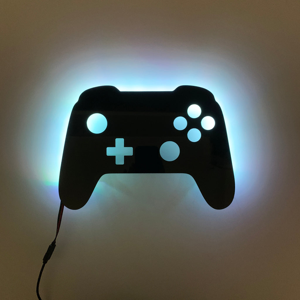 Gaming controller silhouette light